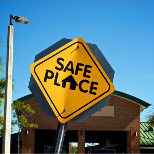 Warning Sign that says safe place representing a trauma safe ministry for kids & teens